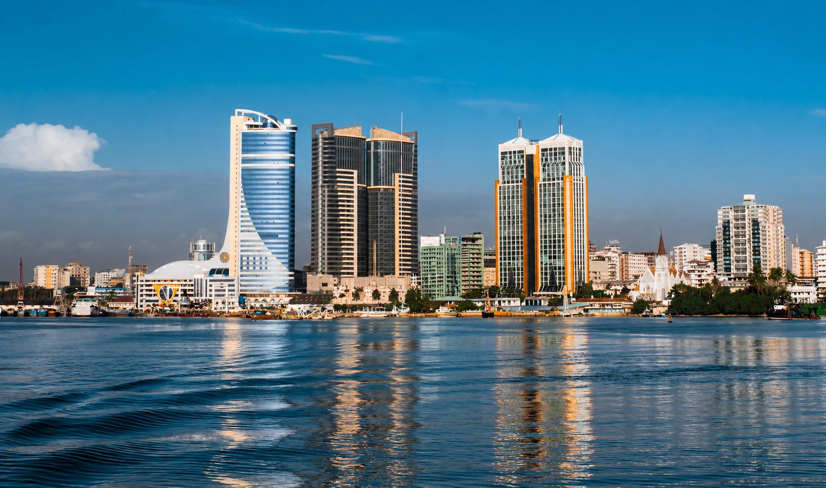 Dar es Salaam city centre skyline seen across the harbour